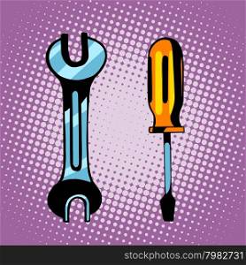 Tools screwdriver and wrench pop art retro style. Tools screwdriver and wrench