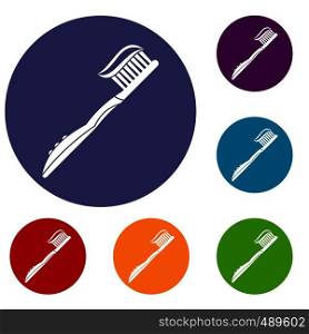 Toothbrush with toothpaste icons set in flat circle red, blue and green color for web. Toothbrush with toothpaste icons set
