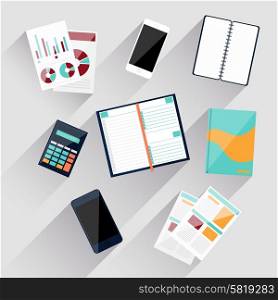 Top view of workplace with calculator, smartphone, stationery and documents