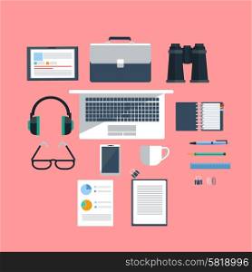 Top view of workplace with notebook, tablet, smartphone, office items and devices on pink background