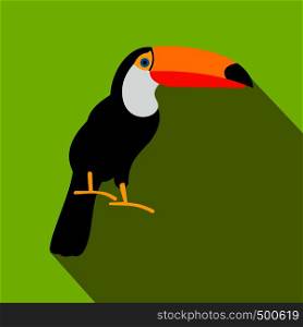 Toucan icon in flat style on a green background . Toucan icon, flat style