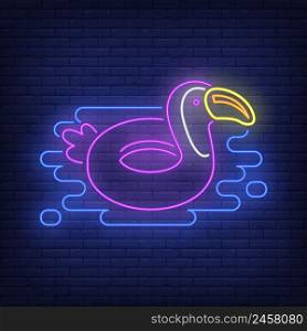 Toucan rubber ring neon sign. Swimming, water, safety. Inflatable toy concept. Vector illustration in neon style for advertising, toy shop, entertainment, business