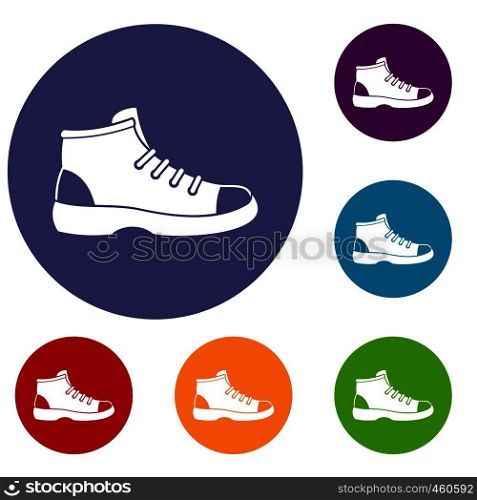 Tourist shoe icons set in flat circle reb, blue and green color for web. Tourist shoe icons set