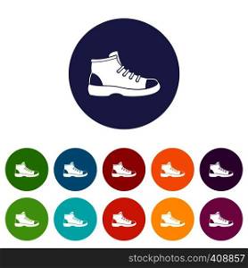 Tourist shoe set icons in different colors isolated on white background. Tourist shoe set icons