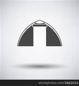 Touristic tent icon on gray background with round shadow. Vector illustration.