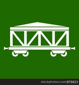Train cargo wagon icon white isolated on green background. Vector illustration. Train cargo wagon icon green