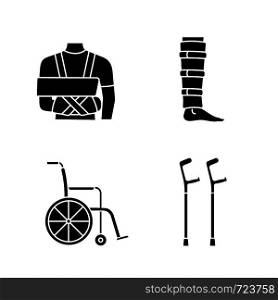 Trauma treatment glyph icons set. Shoulder immobilizer, shin brace, wheelchair, elbow crutches. Silhouette symbols. Vector isolated illustration. Trauma treatment glyph icons set