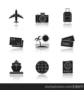 Travel and tourism drop shadow black icons set. Credit cards, tropical island, globe map model, cruise ship, passport, airplane flight, photo camera, suitcase, tickets. Isolated vector illustrations. Travel and tourism drop shadow black icons set
