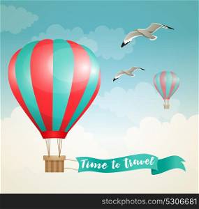 Travel background with air balloon and birds flying in the sky