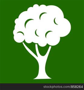 Tree icon white isolated on green background. Vector illustration. Tree icon green
