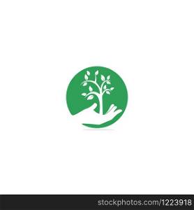 Tree in hand vector logo design. Natural products logo. Cosmetics icon. Spa logo.