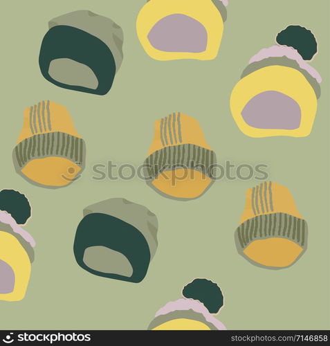 Trendy winter headwear knitted hats seamless pattern on green khaki background. Web, wrapping paper, textile, wallpaper design, background fill.. Trendy winter headwear knitted hats seamless pattern on green khaki background