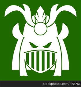 Tribal helmet icon white isolated on green background. Vector illustration. Tribal helmet icon green