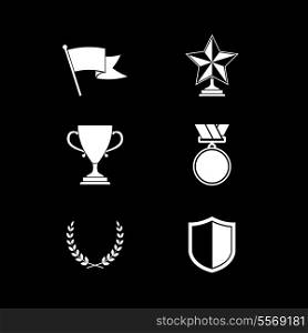Trophy and prize symbols of shield star medal and wreath isolated vector illustration