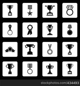 Trophy icons set in white squares on black background simple style vector illustration. Trophy icons set squares vector