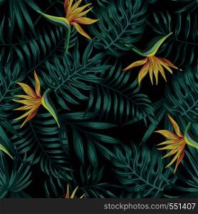 Tropical palm, monstera, fern leaves blue tone and bird of paradise flowers on the black background. Seamless vector pattern
