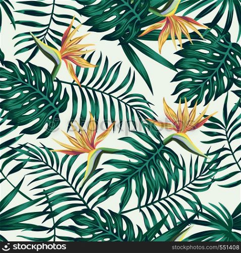 Tropical palm, monstera, fern leaves blue tone and bird of paradise flowers on the white background. Seamless vector pattern
