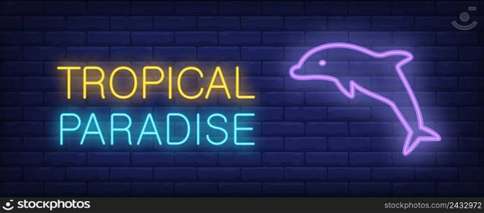Tropical paradise neon style lettering. Dolphin jumping on brick wall. Summer vacation, resort, seaside. Bright wall sign. Can be used for topics like travel, tourism, holiday