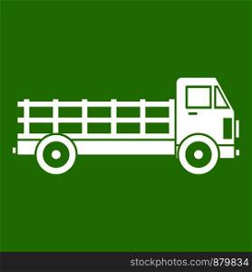 Truck icon white isolated on green background. Vector illustration. Truck icon green