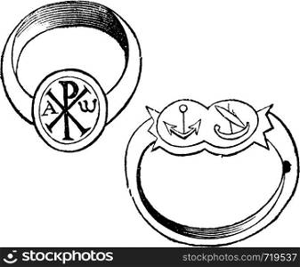 Two christian episcopal rings with symbols vintage engraving. Old engraved illustration of a bishp or archbishop ring, with the fish, dove and monogram of Christ, and the other with fin and branch.