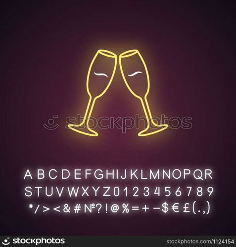 Two clinking wine glasses yellow neon light icon. Champagne flutes. Glassfuls of alcohol drink. Wine service. Celebration. Glowing sign with alphabet, numbers and symbols. Vector isolated illustration