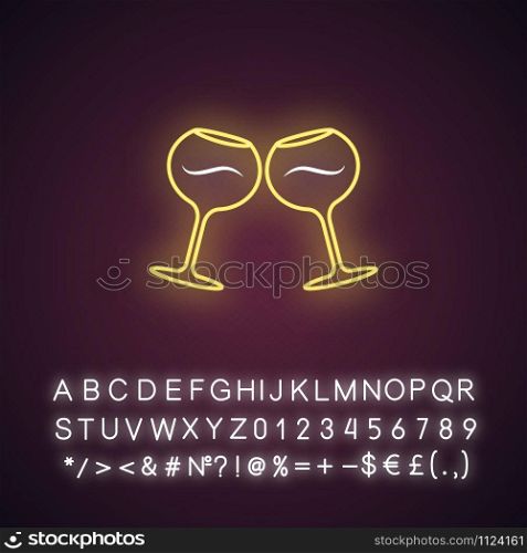 Two clinking wine glasses yellow neon light icon. Glassfuls of alcohol drink. Wine service. Celebration. Toast. Cheers. Glowing sign with alphabet, numbers and symbols. Vector isolated illustration