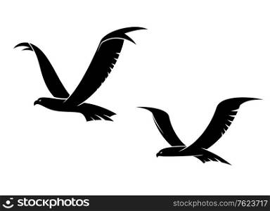 Two graceful flying birds in a black silhouette with outspread wings for tattoo or power concept design