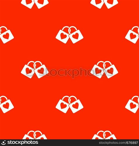 Two locked padlocks with hearts pattern repeat seamless in orange color for any design. Vector geometric illustration. Two locked padlocks with hearts pattern seamless