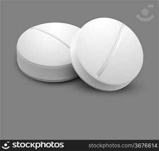 Two pills isolated on gray background