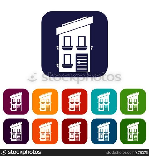 Two-storey house icons set vector illustration in flat style in colors red, blue, green, and other. Two-storey house icons set
