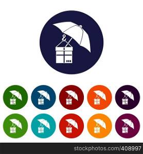 Umbrella and a cardboard box set icons in different colors isolated on white background. Umbrella and a cardboard box set icons