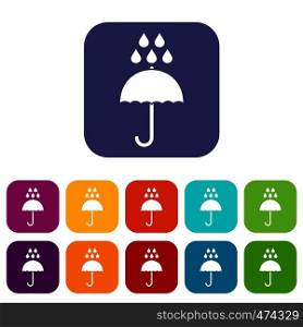 Umbrella and rain drops icons set vector illustration in flat style In colors red, blue, green and other. Umbrella and rain drops icons set