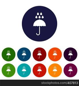 Umbrella and rain drops set icons in different colors isolated on white background. Umbrella and rain drops set icons