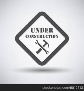 Under construction icon on gray background with round shadow. Vector illustration.