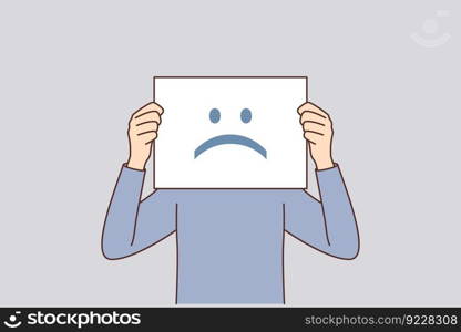 Unhappy emotions on poster hiding man face for concept bad mental state of company employees. Oppressed and demotivated man needs rest to restore his mood and get positive emotions.. Unhappy emotions on poster hiding man face for concept bad mental state of company employees