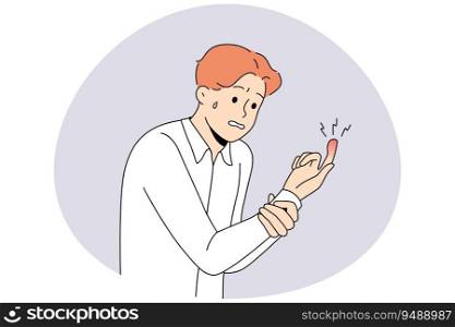 Unhappy man suffer from finger trauma. Unwell guy look at red bruised hand. Hand damage concept. Vector illustration.. Unhealthy man look at finger trauma