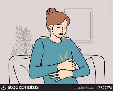 Unhealthy woman sit on couch suffer from stomachache. Unwell female struggle with abdominal pain or cramps. Healthcare. Vector illustration. . Unhealthy woman suffer from stomachache 