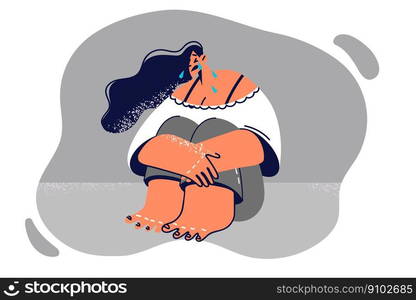 Upset woman sitting on floor crying feeling depressed after learning about boyfriend betrayal. Lonely girl crying and suffering from psychological problems need help of psychotherapist . Upset woman sitting on floor crying feeling depressed after learning about boyfriend betrayal