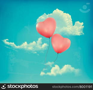 Valentine heart-shaped baloons in a blue sky with clouds. Vector retro background