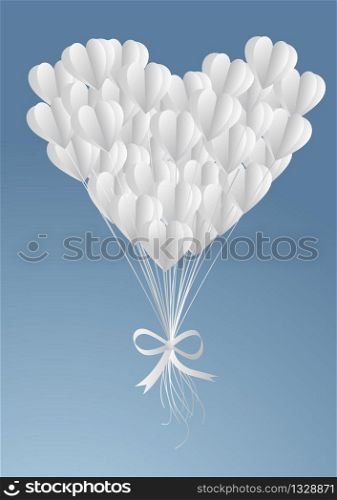 Valentine's Day is a balloon paper heart floating on the sky with clouds in the sky .