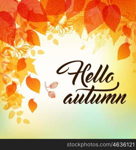 "Vector autumn background with orange and yellow falling leaves. "Hello autumn" lettering."