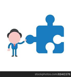 Vector cartoon illustration concept of faceless businessman mascot character holding blue jigsaw puzzle piece symbol icon.