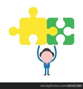 Vector cartoon illustration concept of faceless businessman mascot character holding up yellow and green connected jigsaw puzzle pieces symbol icon.