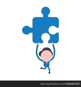 Vector cartoon illustration concept of faceless businessman mascot character running, holding up and carrying blue jigsaw puzzle piece symbol icon.