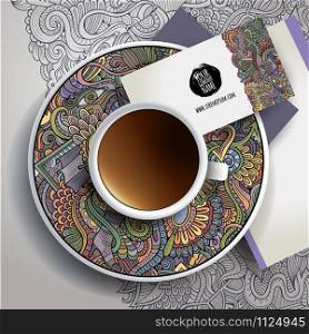 Vector Cup of coffee, business cards and hand drawn ornament on a saucer and background. Vector Cup of coffee