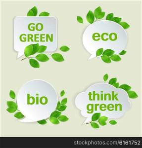 Vector eco labels with green leaves and inscriptions.