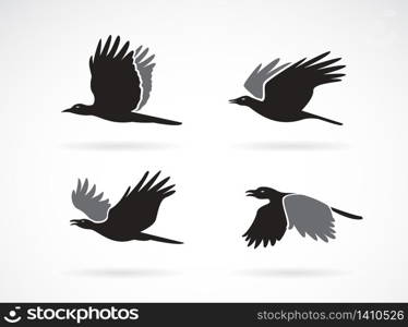 Vector group of black crow flying on white background. Birds. Animals. Easy editable layered vectors illustration.