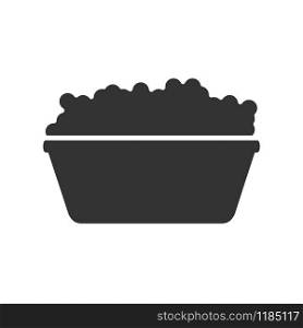 Vector icon of a basin with soapy water and foam. Vector silhouette isolated on a white background. Flat style