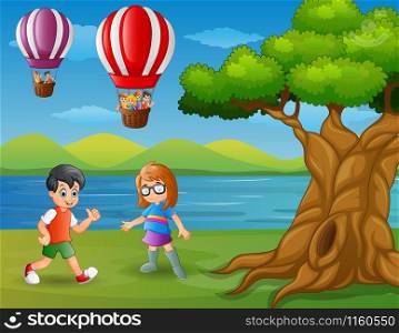 Vector illustration of Cartoon a boy running and a floating hot air balloon