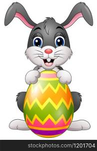 Vector illustration of Cartoon bunny holding Easter egg